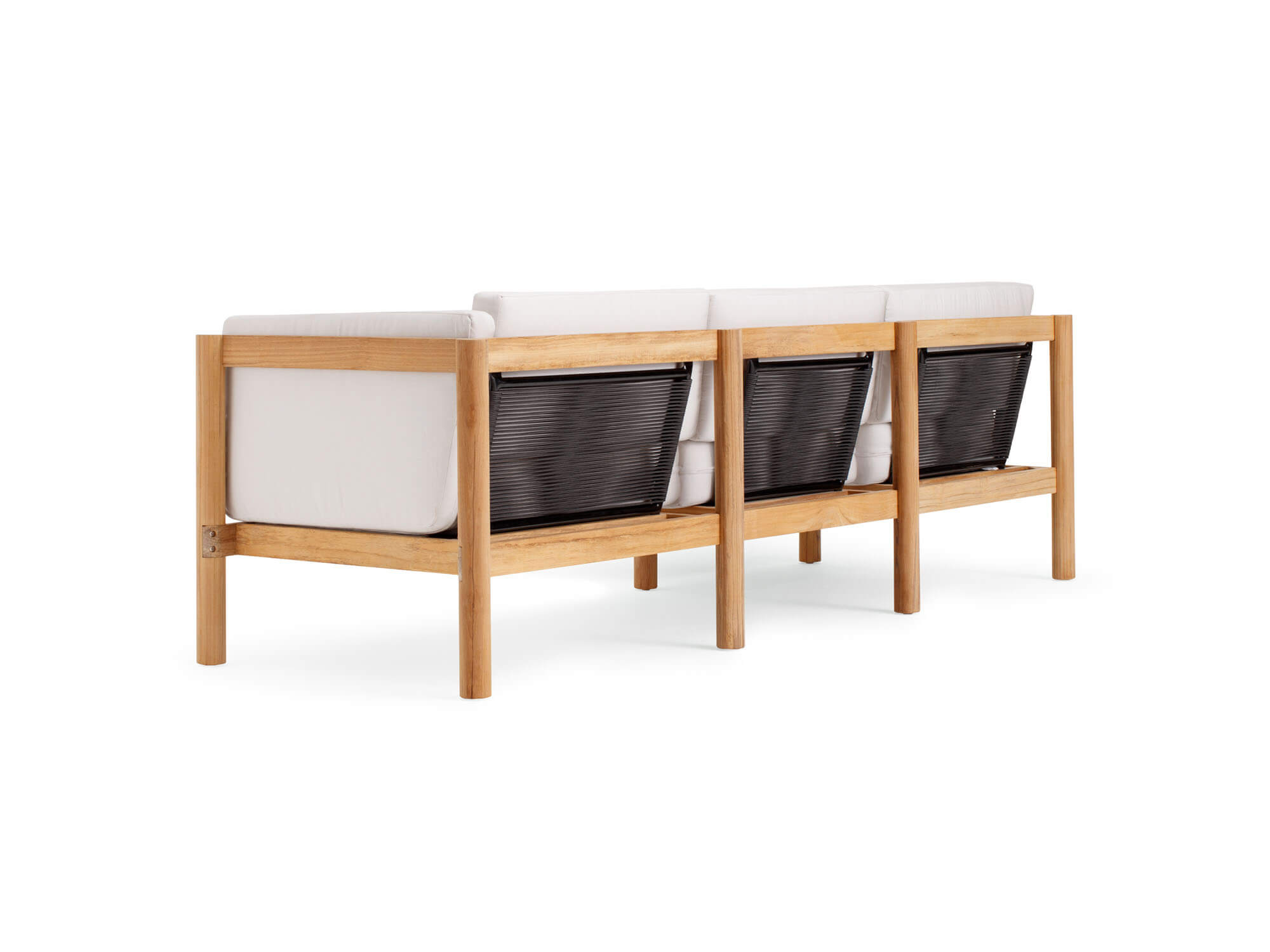 Back angle view of 4-piece outdoor sectional with white arm cushions
